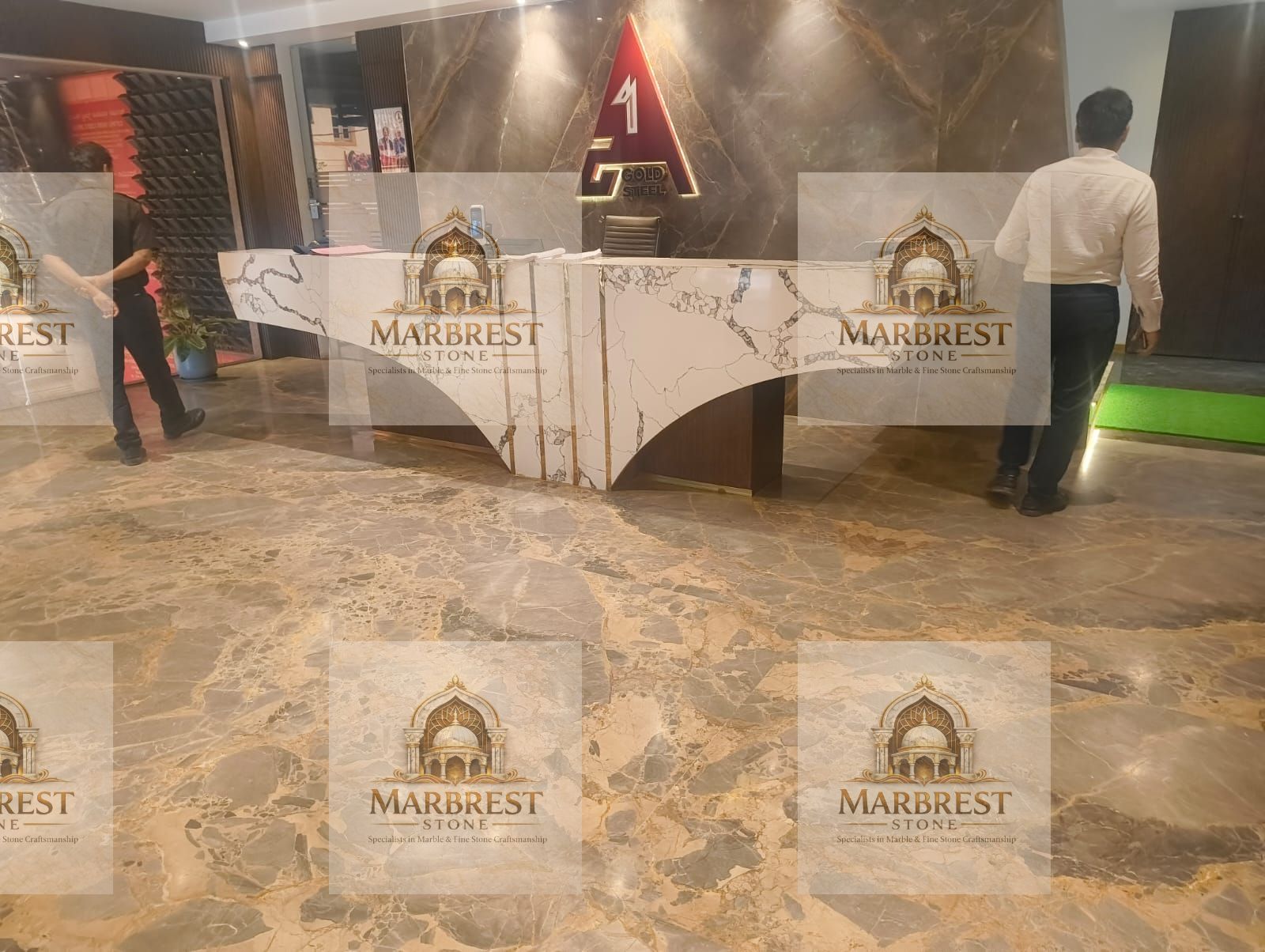 Angular Elegance: Statuario Marble Reception Masterpiece — marble installation by Marbrest Stone, Corporate Office Headquarters